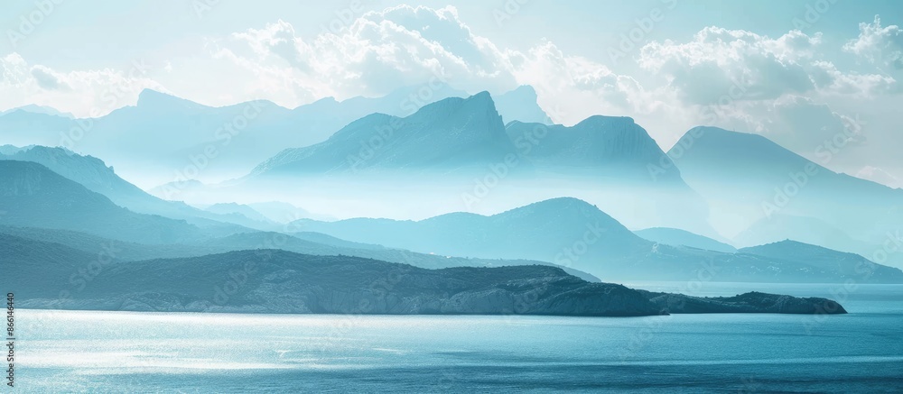 Scenic View of Seascape and Mountain Range with Blurred Background and Space for Text Scenic View of Seascape and Mountain Range with Blurred Background and Space for Text