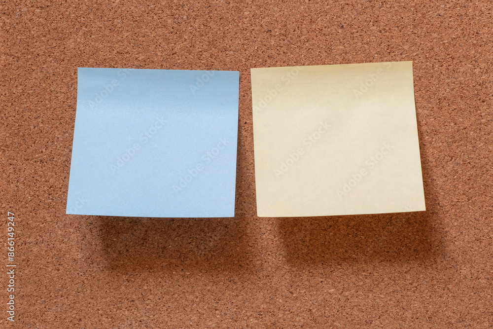 two blank post it notes sticked to wooden memory board two blank post it notes sticked to wooden memory board