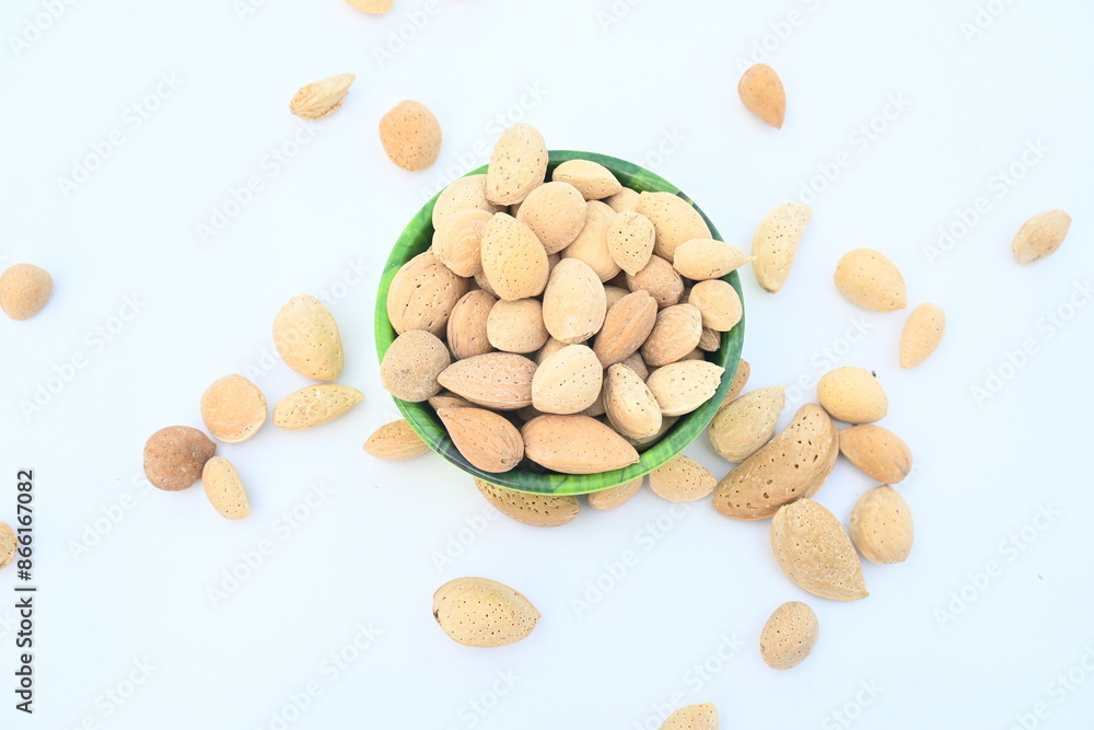 Almond with shell. It's other name Prunus amygdalus and Prunus dulcis. The almond is also the name of the edible and widely cultivated seed of this tree. indian almond. Almond with shell. It's other name Prunus amygdalus and Prunus dulcis. The almond is also the name of the edible and widely cultivated seed of this tree. indian almond.