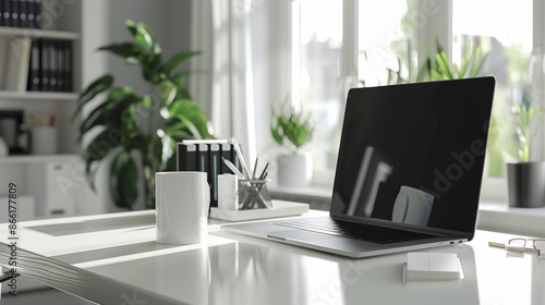 Wallpaper Mural a modern workplace with a laptop computer, a cup of coffee, and office supplies on a white desk Torontodigital.ca