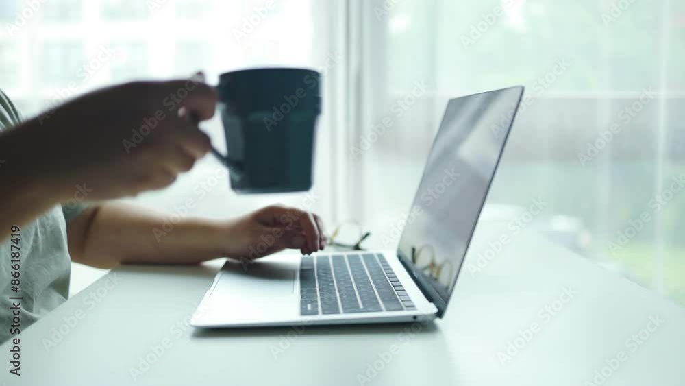 Woman hands texting on laptop keyboard close up, freelancer working on computer at home. Attractive businesswoman studying online, using laptop software, web surfing information or shopping in Woman hands texting on laptop keyboard close up, freelancer working on computer at home. Attractive businesswoman studying online, using laptop software, web surfing information or shopping in
