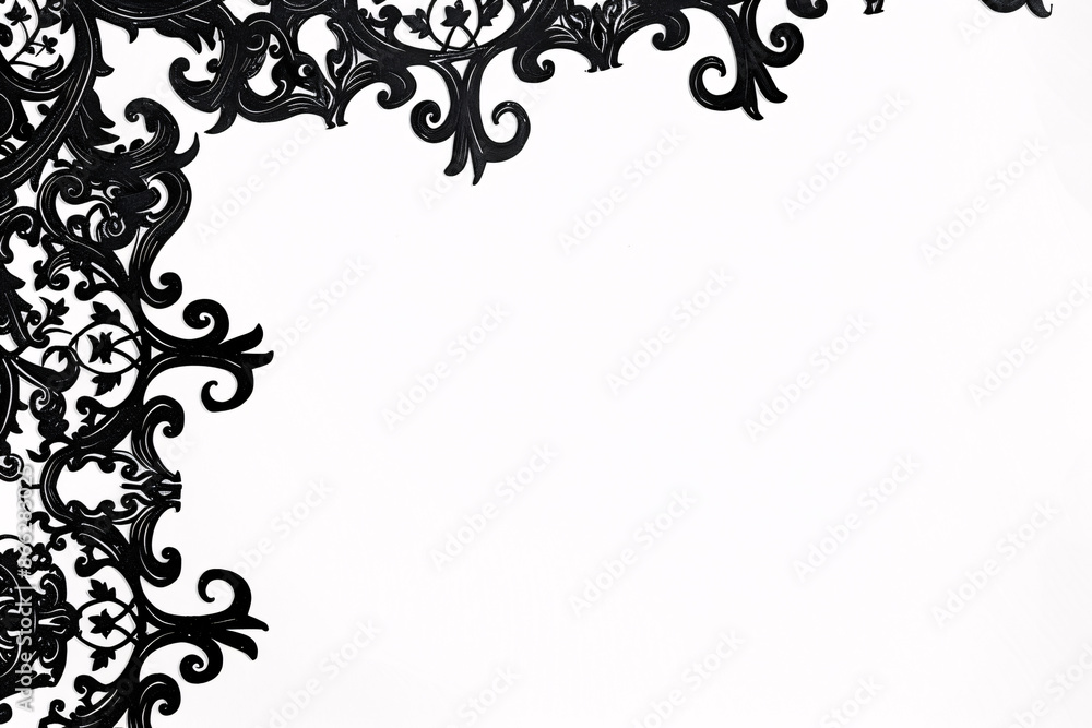 An ornate black corner design with intricate patterns on a white background An ornate black corner design with intricate patterns on a white background