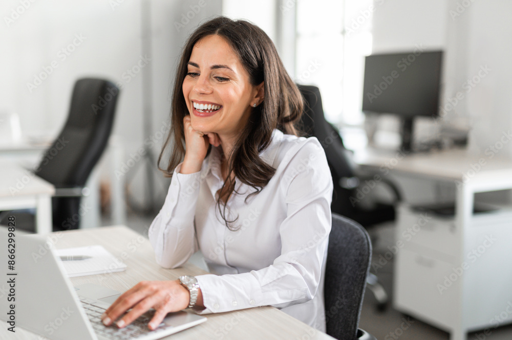 Young attractive freelance worker in co-working space Young attractive freelance worker in co-working space