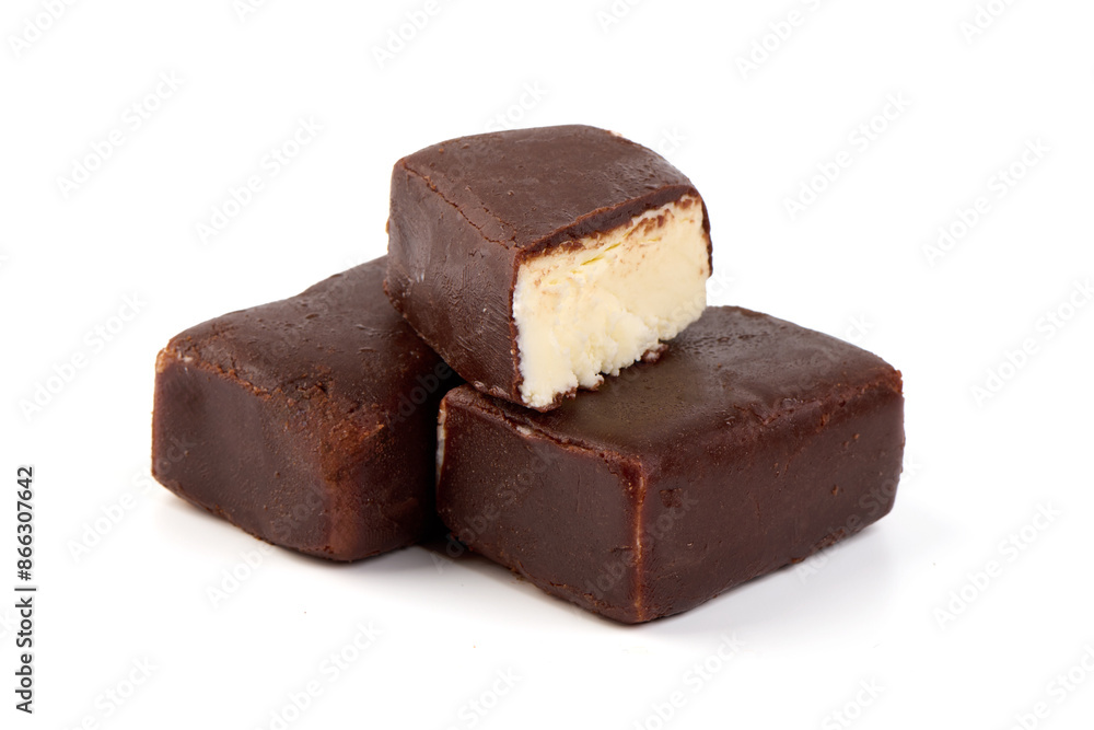 Cheesecake candy bar with chocolate glaze, chocolate curd cheese, isolated on white background. Cheesecake candy bar with chocolate glaze, chocolate curd cheese, isolated on white background.