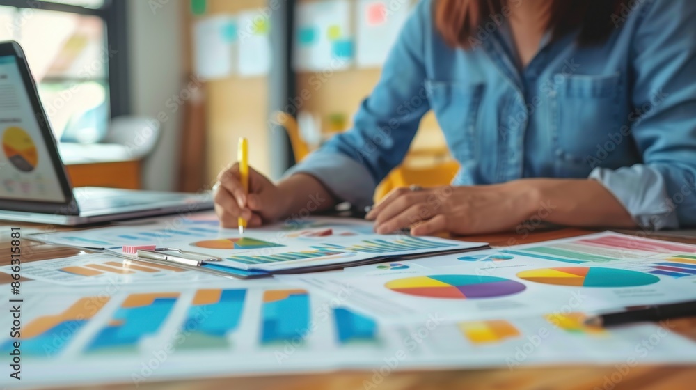 Fototapeta premium A Marketing Manager develops, implements, and oversees marketing strategies and campaigns, analyzing market trends and data to drive brand awareness, customer acquisition, and sales growth. 