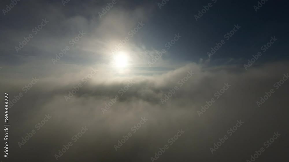 Flying through an amazingly beautiful cloudscape on a fresh morning in the mountain Flying through an amazingly beautiful cloudscape on a fresh morning in the mountain