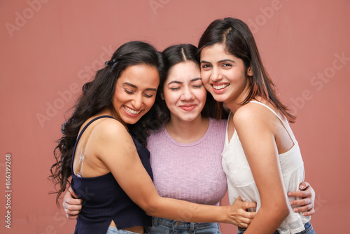 Three Friends Are Enjoying While Hugging 