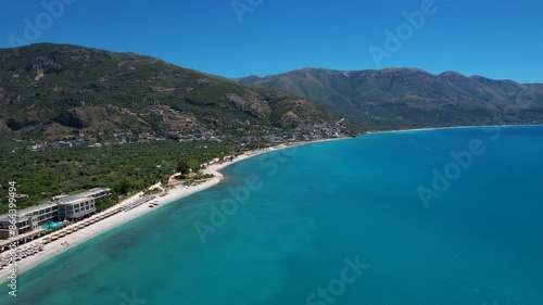 Paradise Beach with White Sand and Azure Ionian Sea: Tourist Summer Destination in the Albania Riviera photo