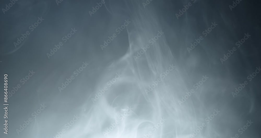 Ambient, abstract smoke and light motion background. Strange, glowing, alien, UFO light, ghost or spirit with smoke and fog for halloween or science fiction, sci-fi background. Ambient, abstract smoke and light motion background. Strange, glowing, alien, UFO light, ghost or spirit with smoke and fog for halloween or science fiction, sci-fi background.