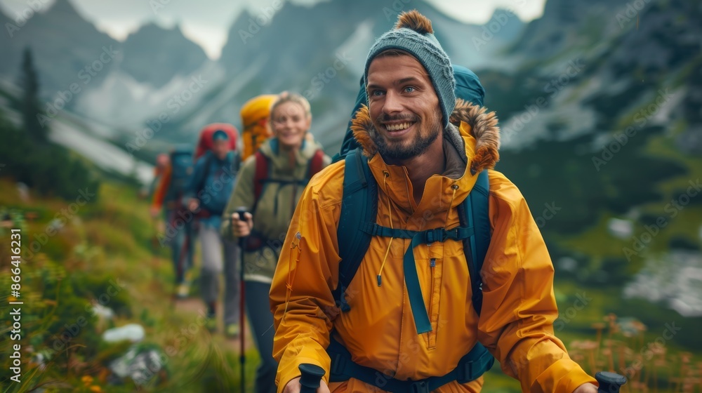 A vibrant and joyful group of hikers walking uphill, smiling and looking directly at the camera A vibrant and joyful group of hikers walking uphill, smiling and looking directly at the camera