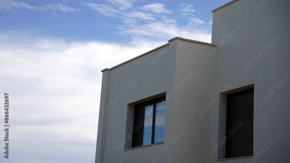 facade of contemporary construction against the sky facade of contemporary construction against the sky