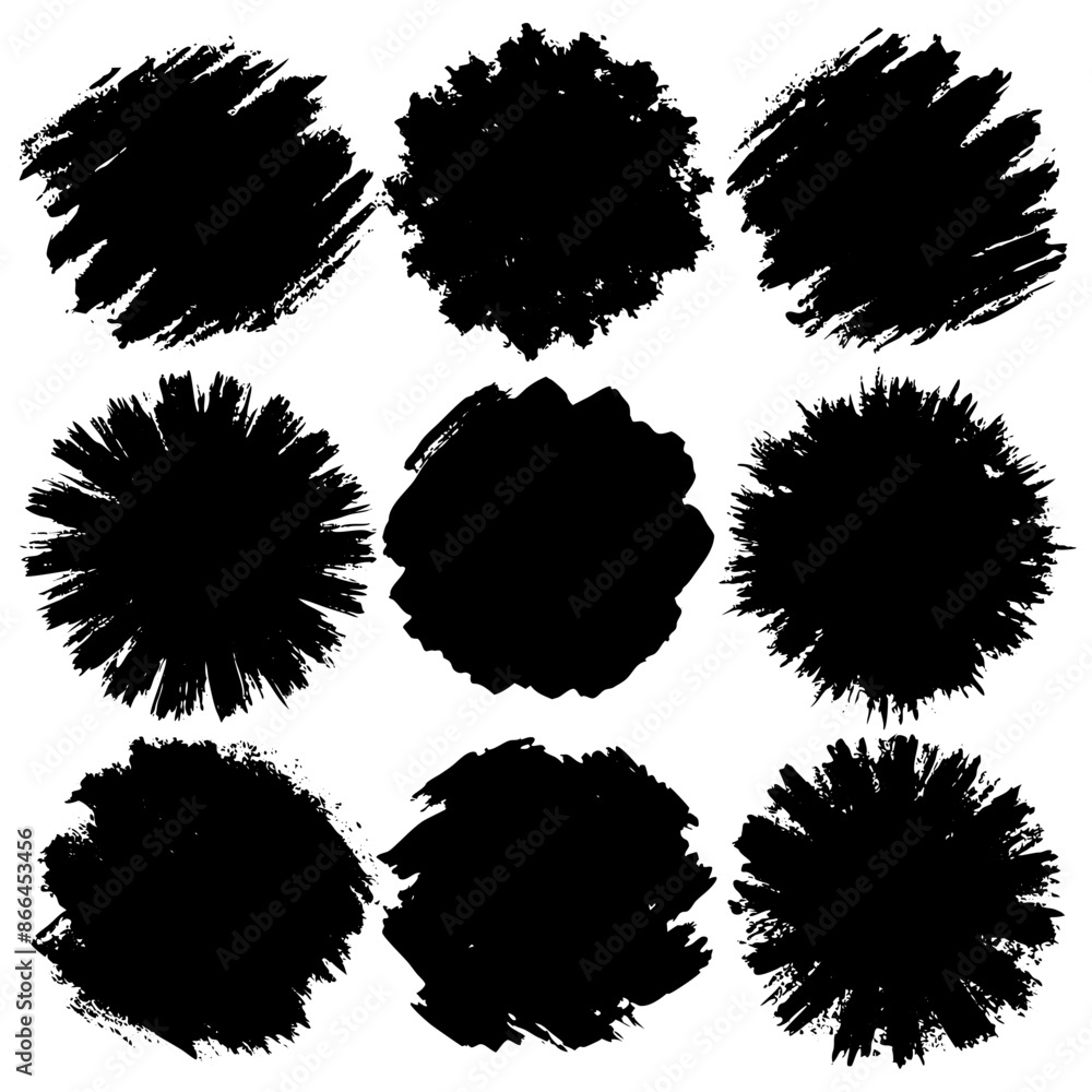 A collection of black brush marks against a white backdrop A collection of black brush marks against a white backdrop