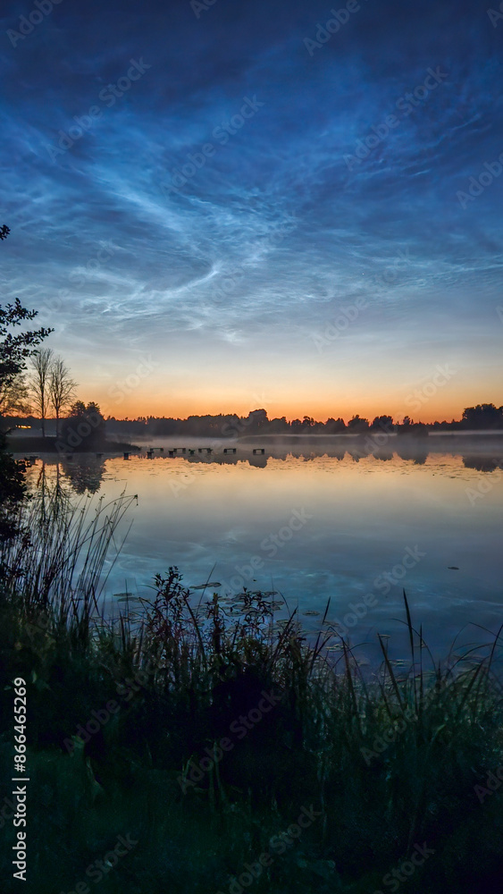 silver clouds shake the lake on a bright summer night silver clouds shake the lake on a bright summer night