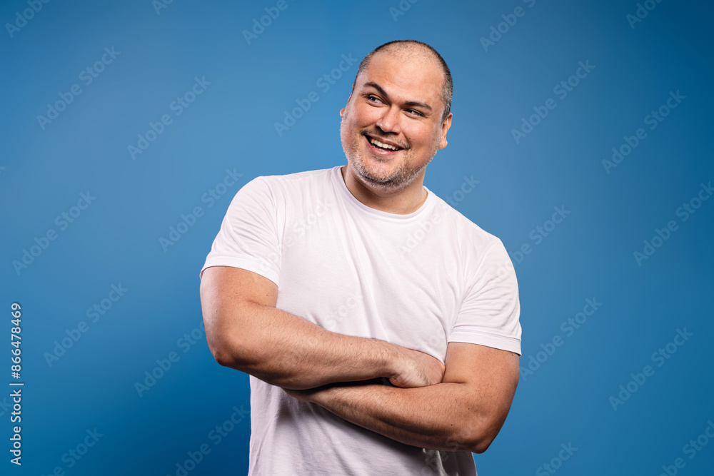 man with arms crossed looking to the side man with arms crossed looking to the side
