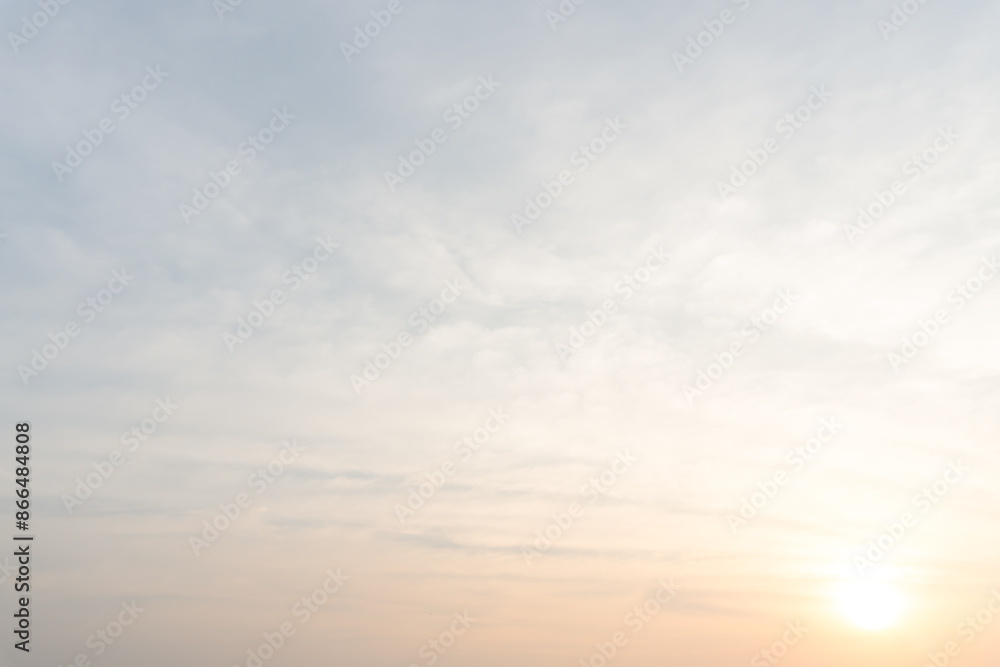Obraz premium Beautiful morning or evening orange sky when sun set or sun rise used as natural background texture in decorative art work
