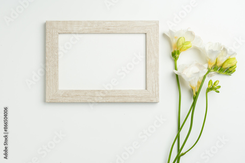 White Wooden Frame With Freesia Flowers Mockup