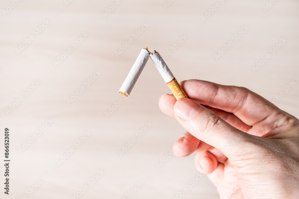 Broken Cigarette in a Hand closeup
