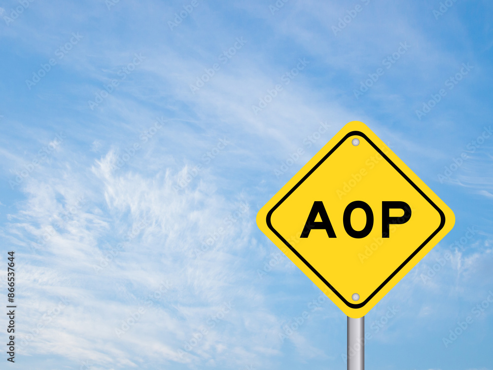 Yellow transportation sign with word AOP (abbreviation of Annual Operating Plan or Aspect-oriented programming) on blue color sky background Yellow transportation sign with word AOP (abbreviation of Annual Operating Plan or Aspect-oriented programming) on blue color sky background