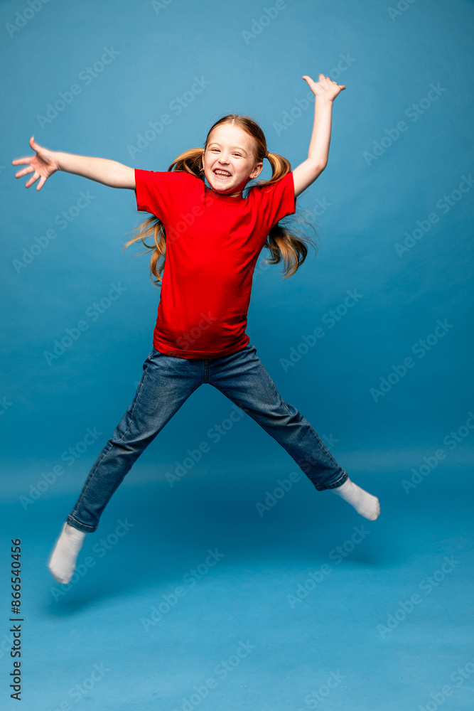 Obraz premium Full length body size view of her she nice attractive pretty carefree cheery cheerful lucky girl jumping having fun free time isolated over bright blue color background, copy space
