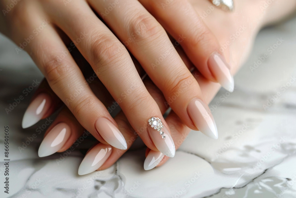 Elegant Manicured Hands with Stiletto Nail Design Elegant Manicured Hands with Stiletto Nail Design