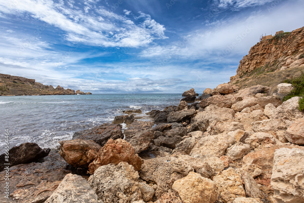 Panoramic view over the Golden Bay and beach (Ghajn Tuffieha) with turquoise, azure sea, Malta travel destination. Panoramic view over the Golden Bay and beach (Ghajn Tuffieha) with turquoise, azure sea, Malta travel destination.