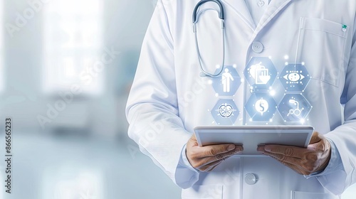 Doctor holding a tablet with holographic medical icons, telemedicine, digital healthcare