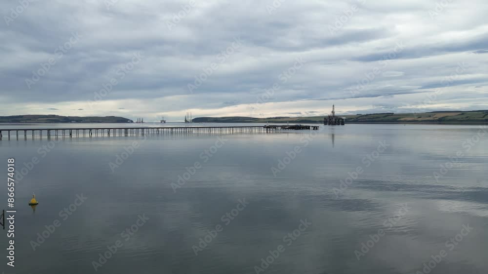 oil rig platforms maintenance english scottish coast low altitude flying over water early morning forward aerial drone oil rig platforms maintenance english scottish coast low altitude flying over water early morning forward aerial drone
