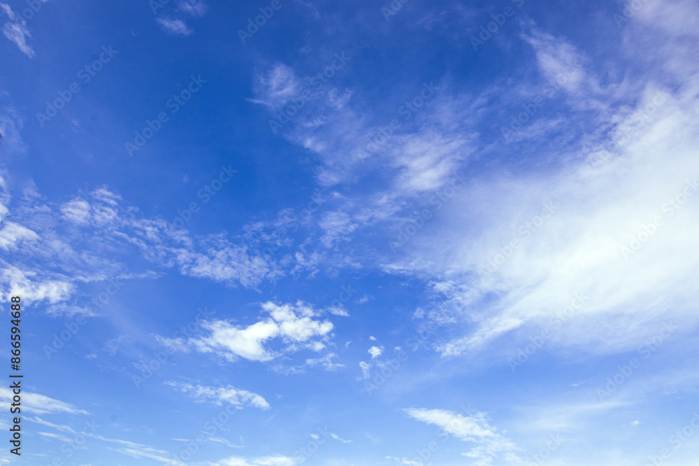 blue sky with clouds.,The daytime sky is clear with some clouds. blue sky with clouds.,The daytime sky is clear with some clouds.