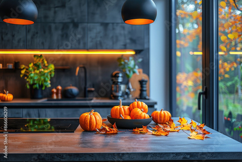 Modern kitchen interior decorated for fall with orange pumpkins, autumn home decoration photo