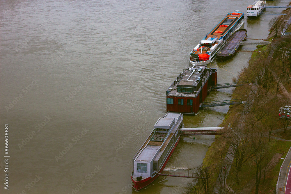 Promenade near Danube river with moored boats, Bratislava, Slovakia Promenade near Danube river with moored boats, Bratislava, Slovakia