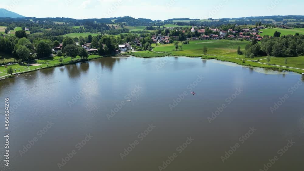 bayersoiener see busy day sunny summer green water lake hot warm countryside fields grass aerial drone bayersoiener see busy day sunny summer green water lake hot warm countryside fields grass aerial drone