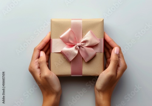 Woman Holding White Gift Box With Pink Bow
