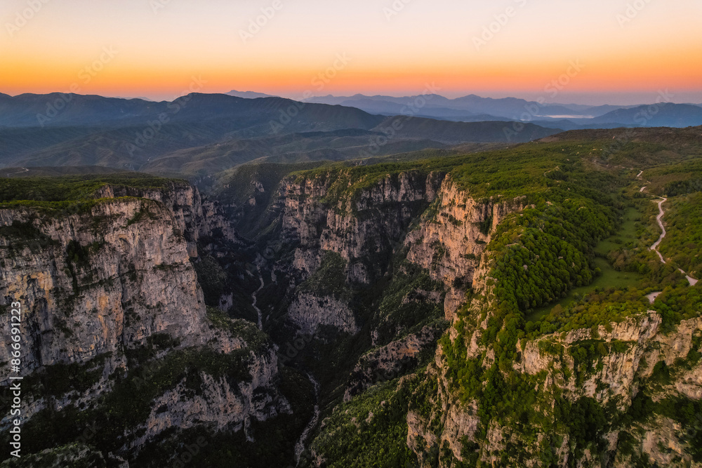 Vikos Gorge from the Oxya Viewpoint in the national park in Vikos-Aoos in zagori, northern Greece. Nature landscape Vikos Gorge from the Oxya Viewpoint in the national park in Vikos-Aoos in zagori, northern Greece. Nature landscape