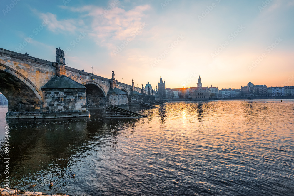 Fototapeta premium View of the city of Prague and the Vltava river with Old Town Bridge Tower on Charles bridge in Prague, Czech Republic.