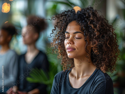 Woman Meditating with Closed Eyes photo