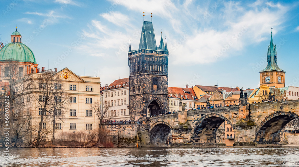 Obraz premium View of the city of Prague and Vltava river with Charles bridge with Old Town Bridge Tower in Prague, Czech Republic.