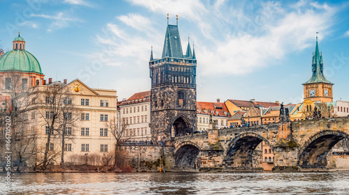View of the city of Prague and Vltava river with Charles bridge with Old Town Bridge Tower in Prague, Czech Republic.