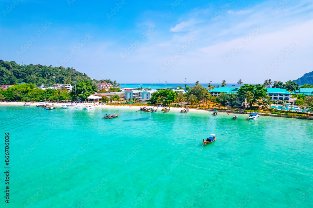 longtail boat turquoise clear water in Phi Phi, Krabi Thailand. Amazing travel landscape photo in Thai longtail boat turquoise clear water in Phi Phi, Krabi Thailand. Amazing travel landscape photo in Thai