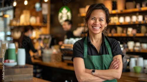 A smiling woman in a green apron stands in front of a Starbucks counter. Generate AI image