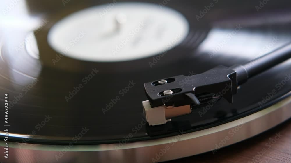 vinyl record player, music vinyl disk record spinning in the turntable. selective focus vinyl record player, music vinyl disk record spinning in the turntable. selective focus