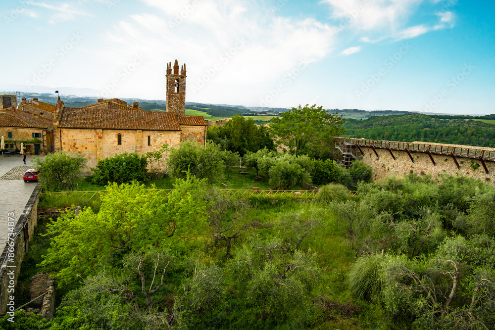 View of Monteriggioni, Tuscany medieval town on the hill. View of Monteriggioni, Tuscany medieval town on the hill.