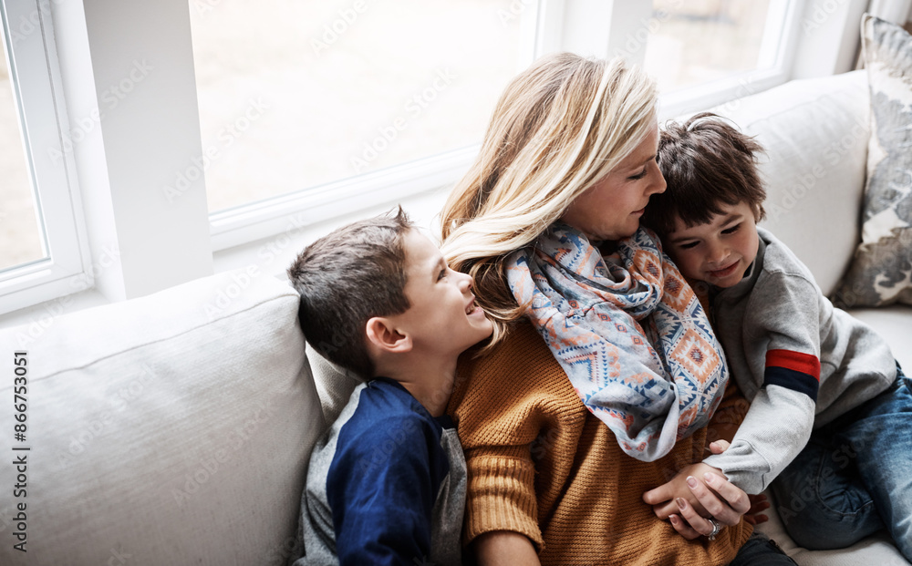 Relax, hug and mother with children on sofa for bonding, loving relationship and happy together in home. Family, love and mom with young boys embrace for affection, care and smile in living room Relax, hug and mother with children on sofa for bonding, loving relationship and happy together in home. Family, love and mom with young boys embrace for affection, care and smile in living room