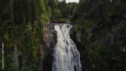 Autumnal landscape of Homla river near Hommelvik, middle Norway. Area of Storfossen waterfall. Bird point of view - Aerial Shot