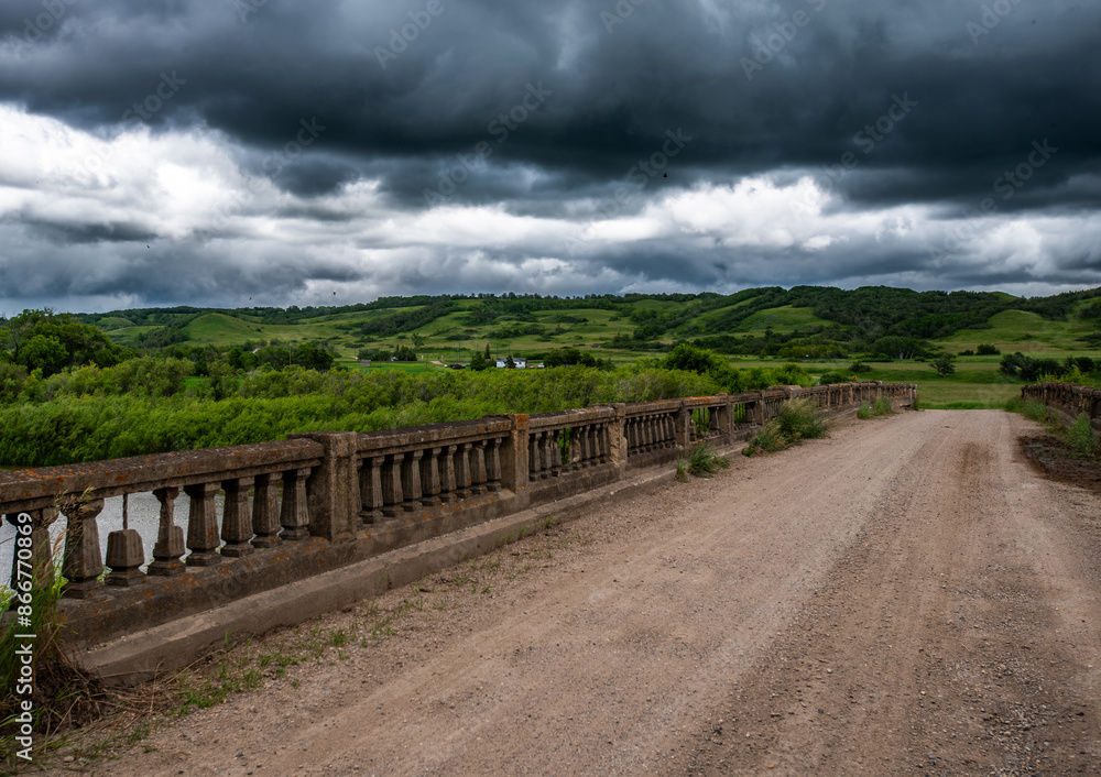 old stone bridge with stormy skies old stone bridge with stormy skies