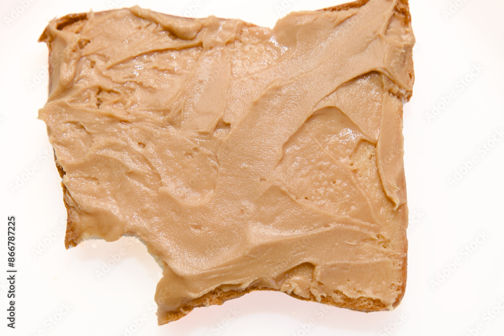 Single Bite Out of a Peanut Butter Toast Single Bite Out of a Peanut Butter Toast