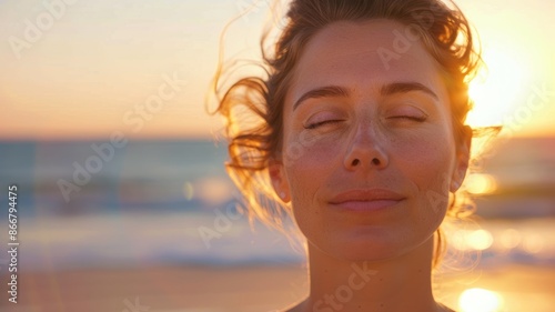 A woman peacefully enjoys a sunset moment on the beach, capturing serenity in nature and the beauty of the scene AIG58 photo