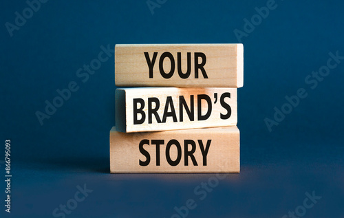 Branding and your brand story symbol. Concept words Your brands story on beautiful wooden blocks. Beautiful grey table grey background. Business branding your brand story concept. Copy space. © Dzmitry