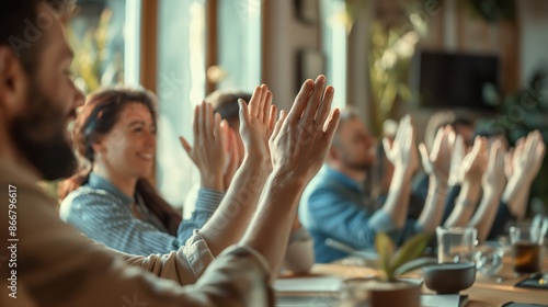 Wallpaper Mural A group of people clapping and smiling at a successful meeting in a bright office. Torontodigital.ca