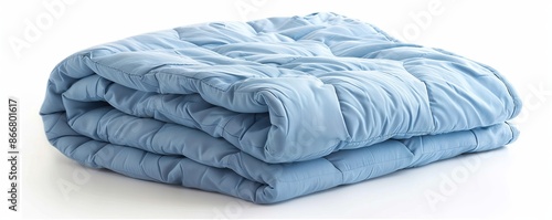 Folded light blue comforter on white background, cozy bedding concept