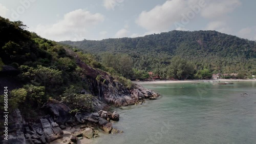 aerial Paradise: Crystal Clear Waters and Lush Palms of Koh Phangan Beach photo